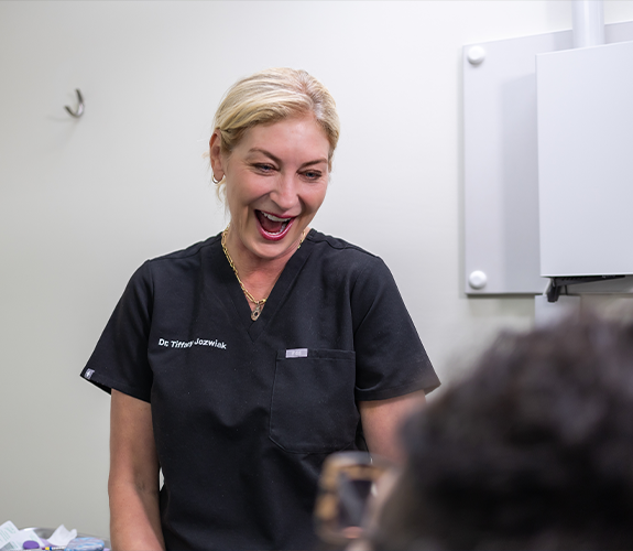 Doctor Jozwiak smiling at a patient